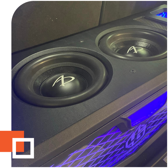 Alpine subwoofers installed in trunk